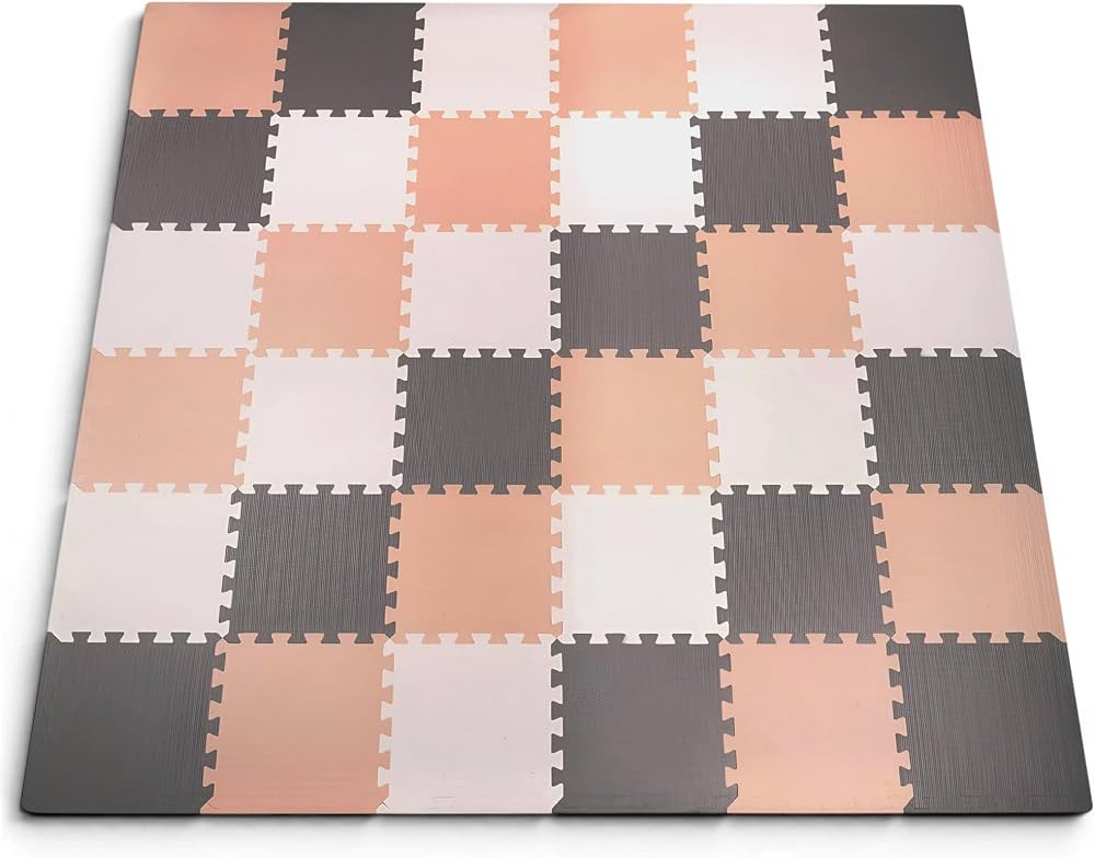 Interlocking foam floor tiles laid on a hard floor to create a stable, slightly cushioned surface for low-impact home cardio
